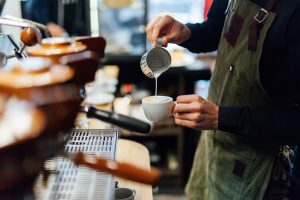 Barista making coffee