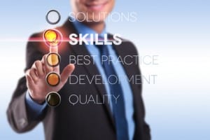 Man pointing at skills sign